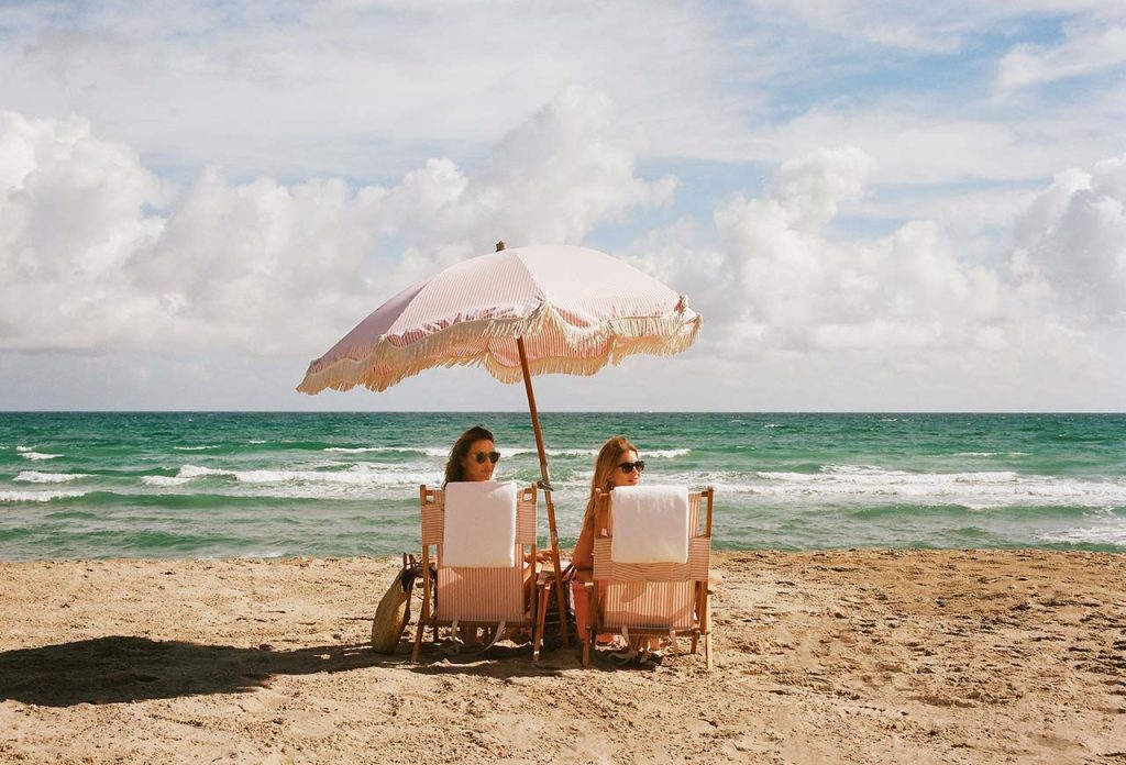two ladies in beach chairs