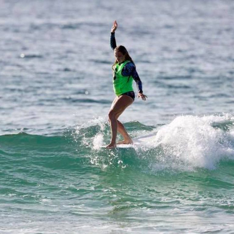 surfer girl hanging 10