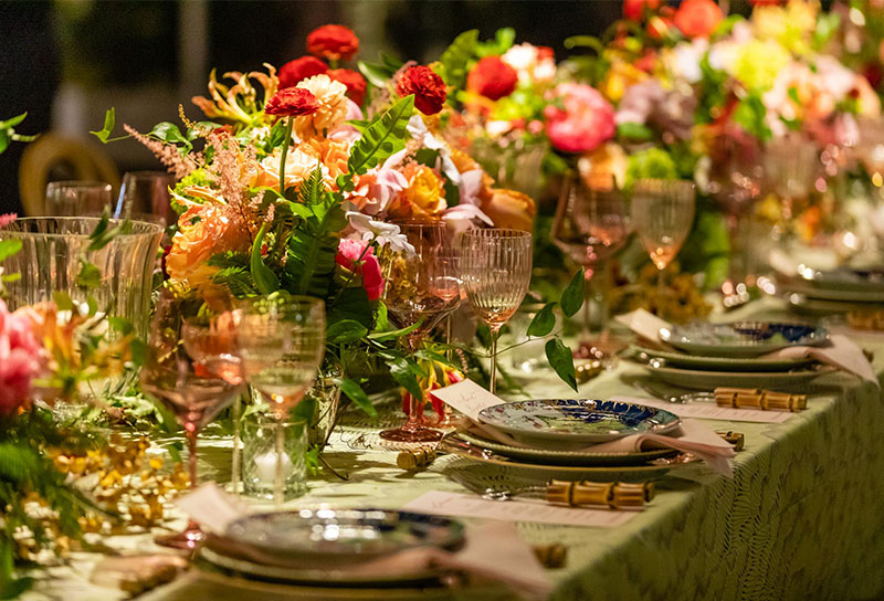 Wedding reception table with beautiful floral arrangement.